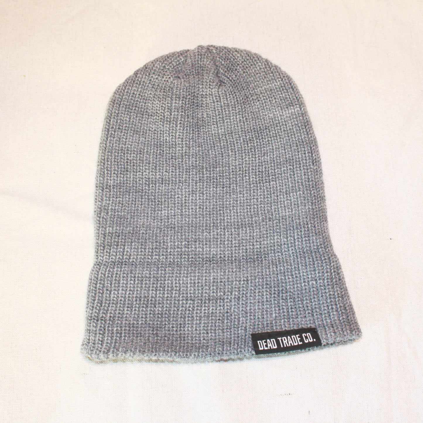 Comfortable, mid-low profile ribbed knit, made-in-Canada toque/beanie, 100% acrylic, 8" with folded cuff. Available in 6 colors. Soft, durable, with an embroidered tag on the cuff. Manufactured in Quebec, finished in Alberta, Canada.