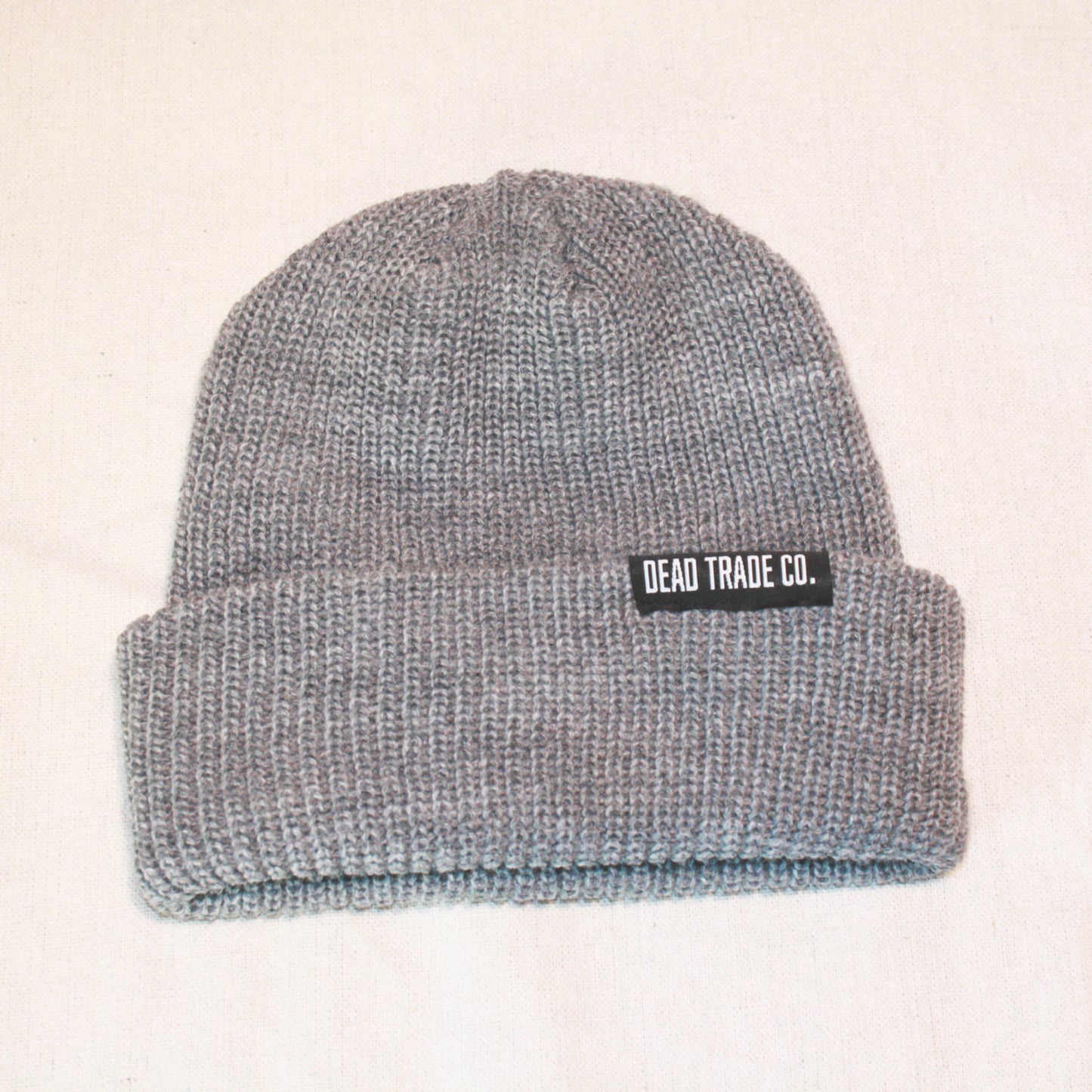 Comfortable, mid-low profile ribbed knit, made-in-Canada toque/beanie, 100% acrylic, 8" with folded cuff. Available in 6 colors. Soft, durable, with an embroidered tag on the cuff. Manufactured in Quebec, finished in Alberta, Canada.