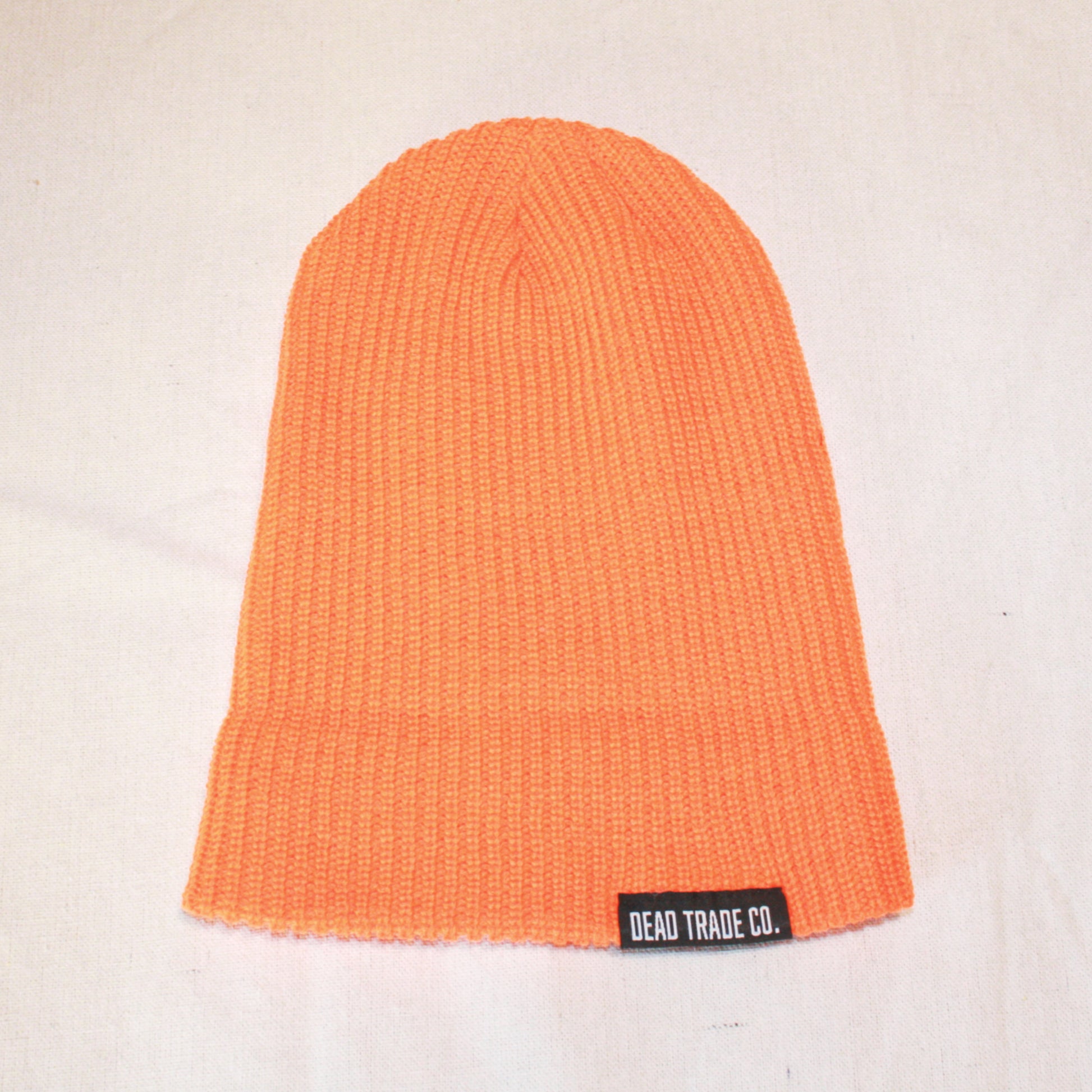 Comfortable, mid-low profile ribbed knit, made-in-Canada toque/beanie, 100% acrylic, 8" with folded cuff. Available in 6 colors. Soft, durable, with an embroidered tag on the cuff. Manufactured in Quebec, finished in Alberta, Canada.