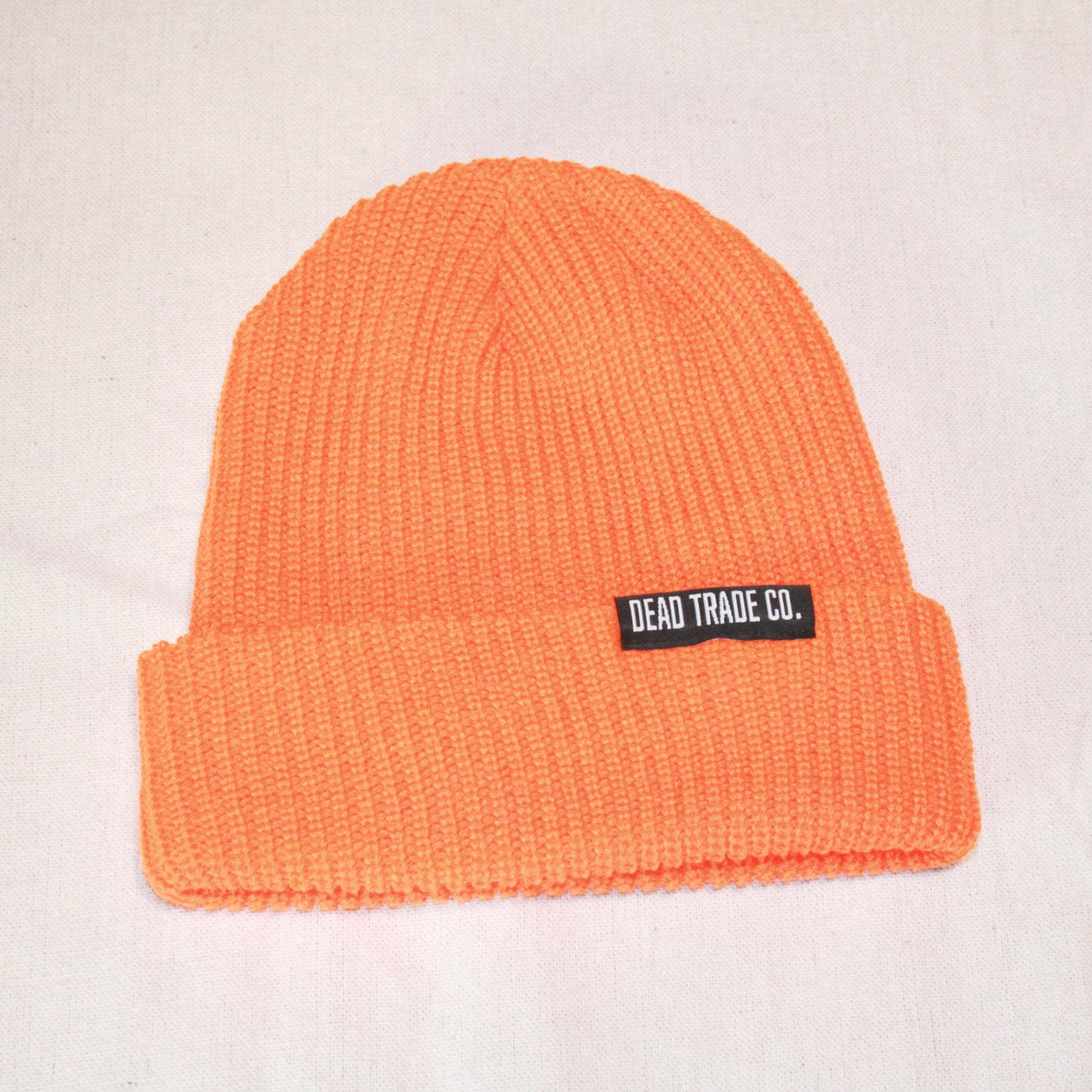 Comfortable, mid-low profile ribbed knit, made-in-Canada toque/beanie, 100% acrylic, 8" with folded cuff. Available in 6 colors. Soft, durable, with an embroidered tag on the cuff. Manufactured in Quebec, finished in Alberta, Canada.