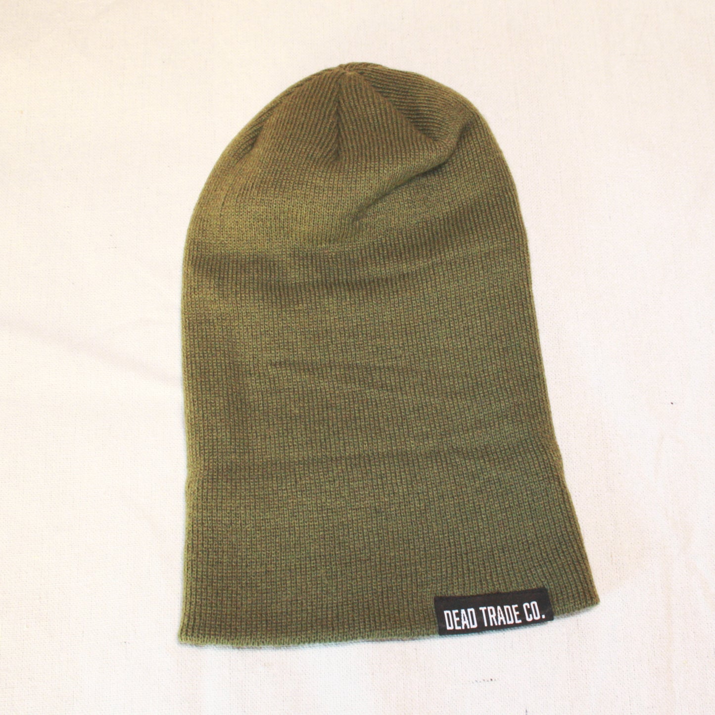 Comfortable, mid-low profile tight-knit, made-in-Canada toque/beanie, 100% acrylic, 8.5" with folded cuff. Available in 3 colors. Soft, durable, with an embroidered tag on the cuff. Manufactured in Quebec, finished in Alberta, Canada.