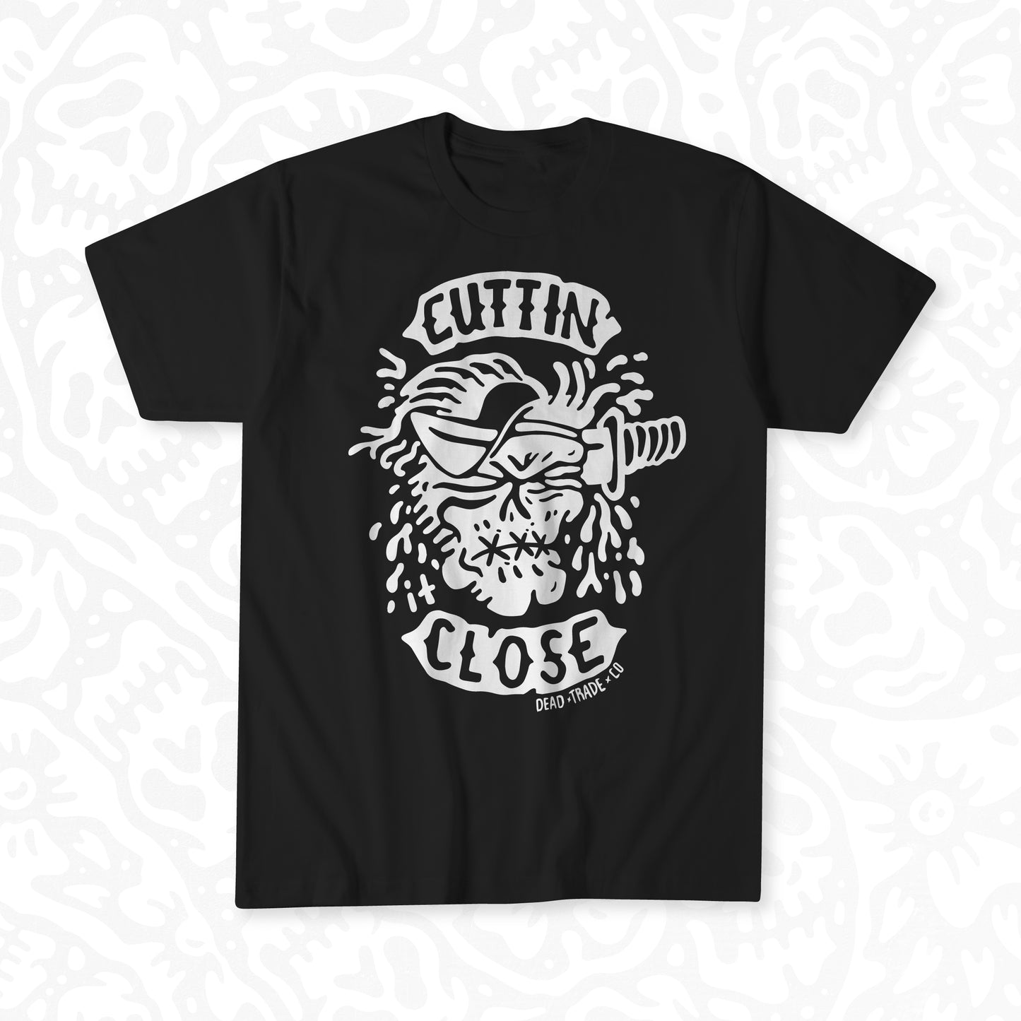 Black graphic t-shirt made in Canada from a soft 100% ring-spun cotton, featuring a bold hand-drawn design of a zombie getting its face sliced off, screen printed in white ink. Perfect for those who appreciate lowbrow, horror-inspired artwork.