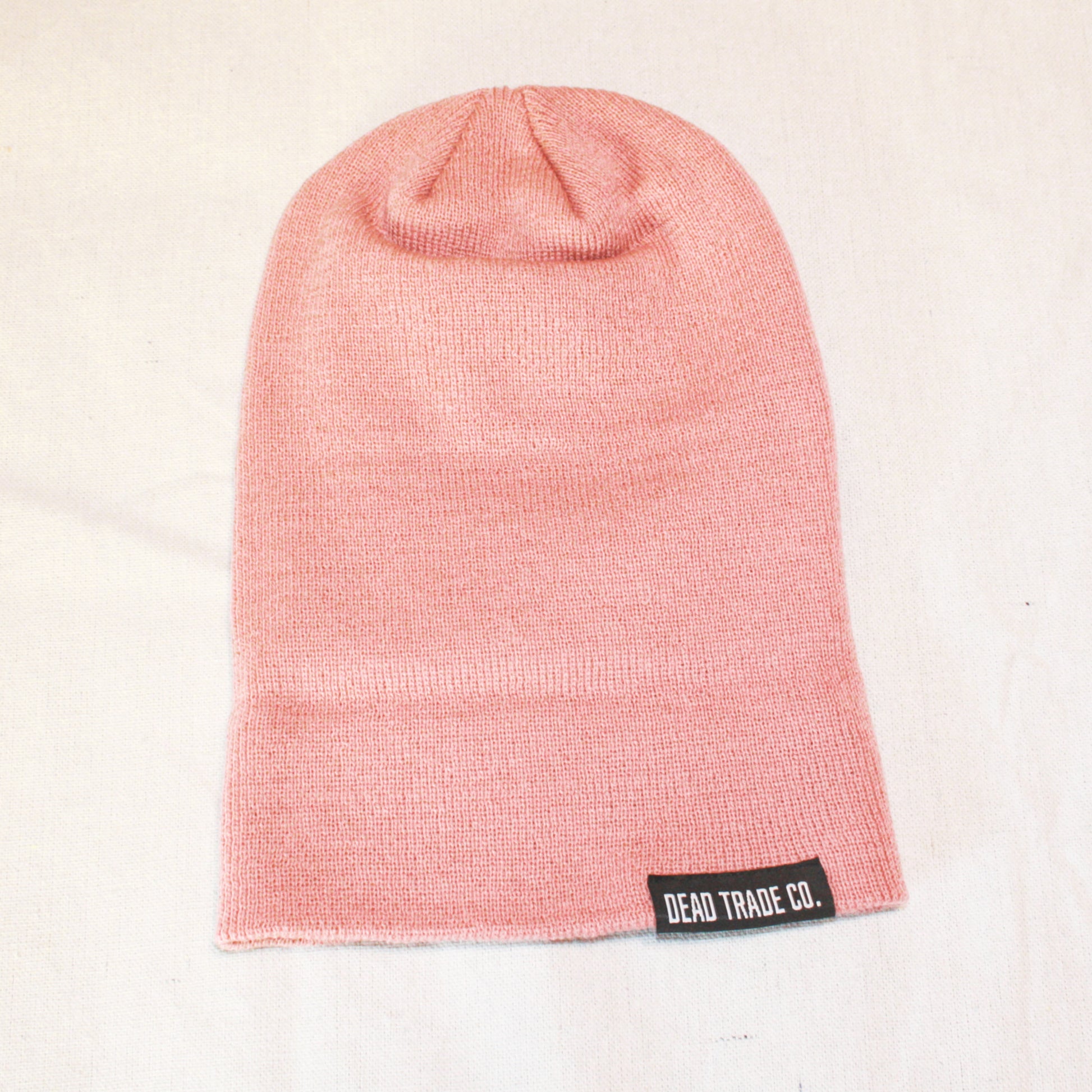 Comfortable, mid-low profile tight-knit, made-in-Canada toque/beanie, 100% acrylic, 8.5" with folded cuff. Available in 3 colors. Soft, durable, with an embroidered tag on the cuff. Manufactured in Quebec, finished in Alberta, Canada.