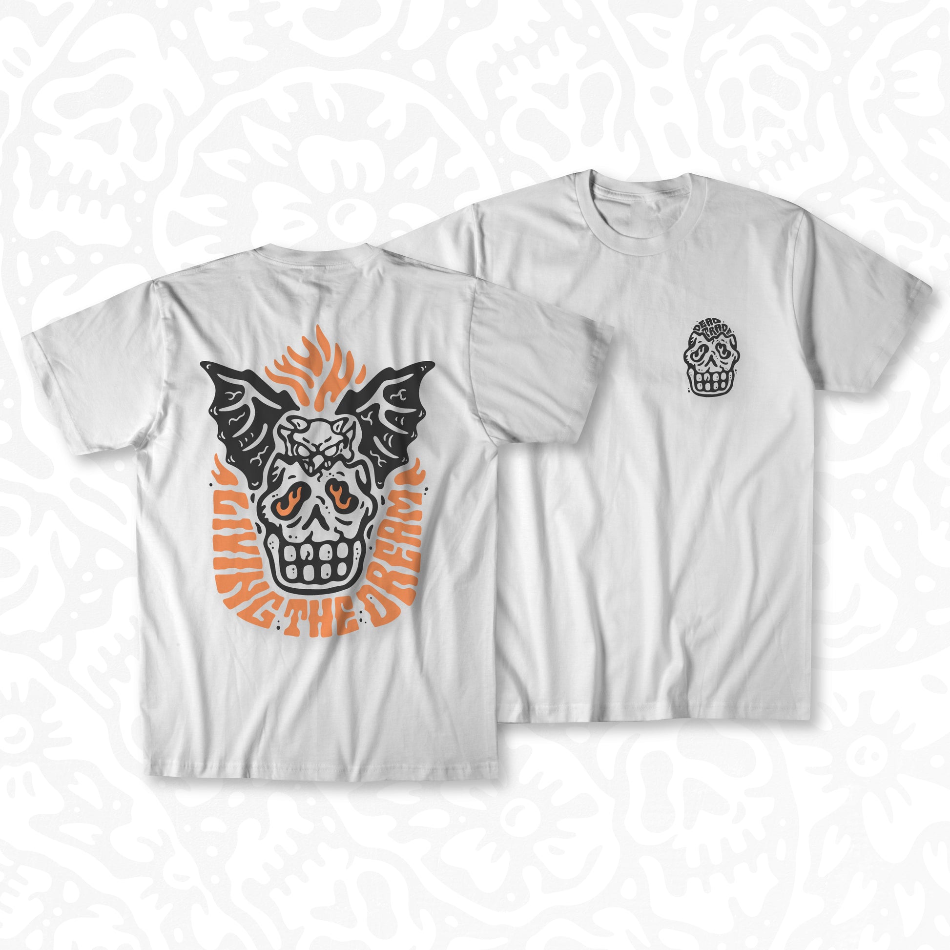 White graphic t-shirt made in Canada from a soft 100% ring-spun cotton, featuring a bold hand-drawn design of a broken skull with a winged demon peaking out the top, screen printed in black and bright orange ink. Perfect for those who appreciate lowbrow, tattoo-style artwork.