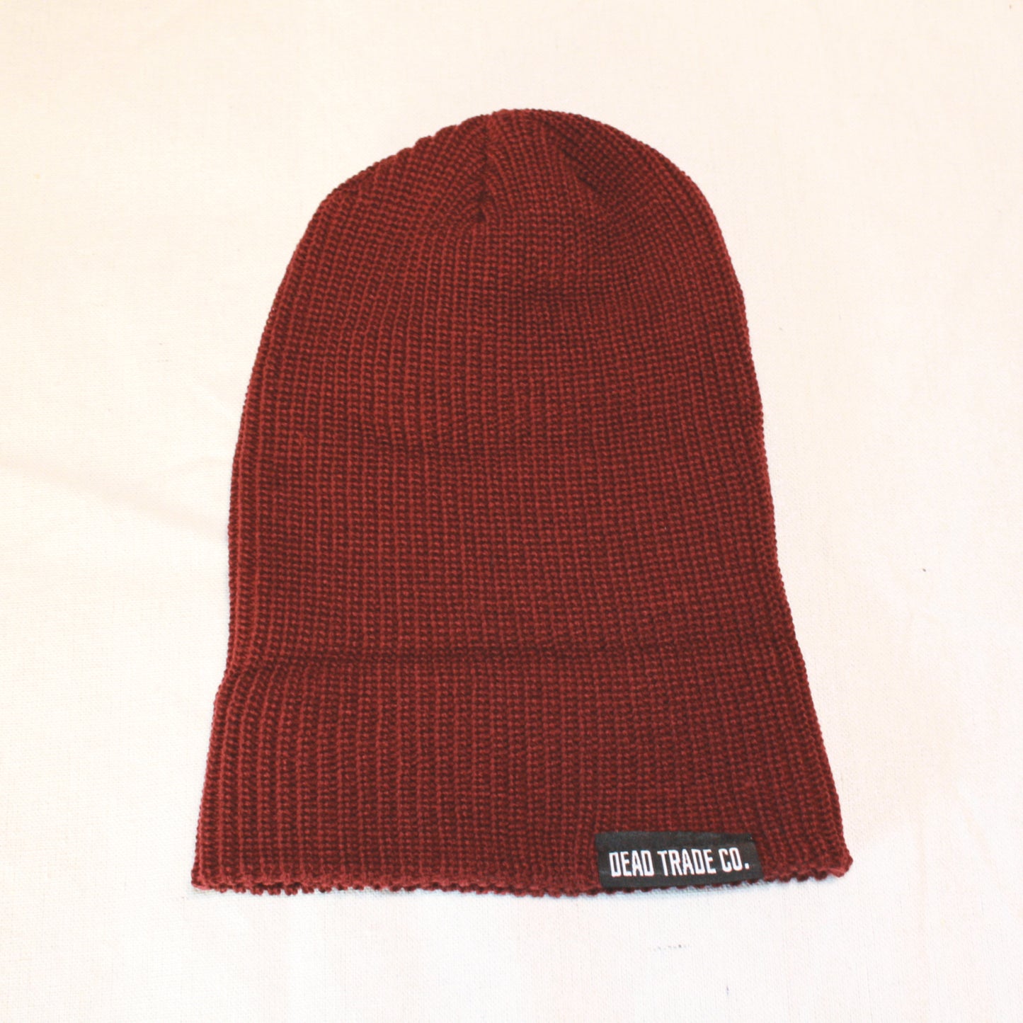 Comfortable, mid-low profile ribbed knit, made-in-Canada toque/beanie, 100% acrylic, 8" with folded cuff. Available in 6 colors. Soft, durable, with an embroidered tag on the cuff. Manufactured in Quebec, finished in Alberta, Canada.