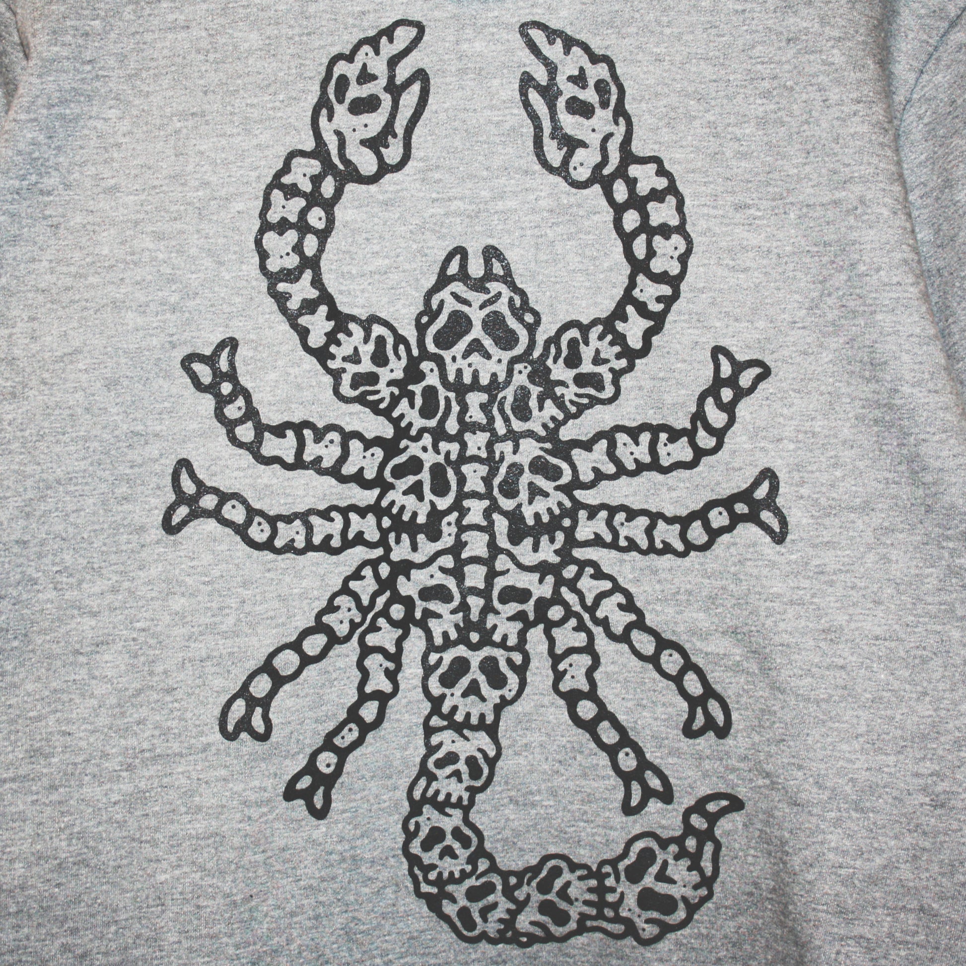 Grey colour, high-quality, made-in-Canada hoodie featuring a hand-drawn scorpion made of skulls screen printed in black on the back. Crafted with 50/50 ring-spun poly/cotton fleece, soft feel, reduced pilling, and durability. Unisex size, 14oz, perfect for cold Canadian winters.