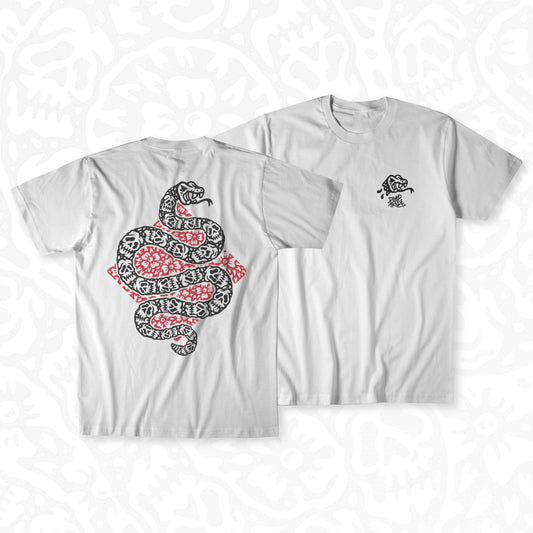 White graphic t-shirt made in Canada from a soft 100% ring-spun cotton, featuring a bold hand-drawn design of a snake with skull-patterned skin, surrounded by flowers, screen printed in black and red ink. Perfect for those who appreciate lowbrow, tattoo-style artwork.