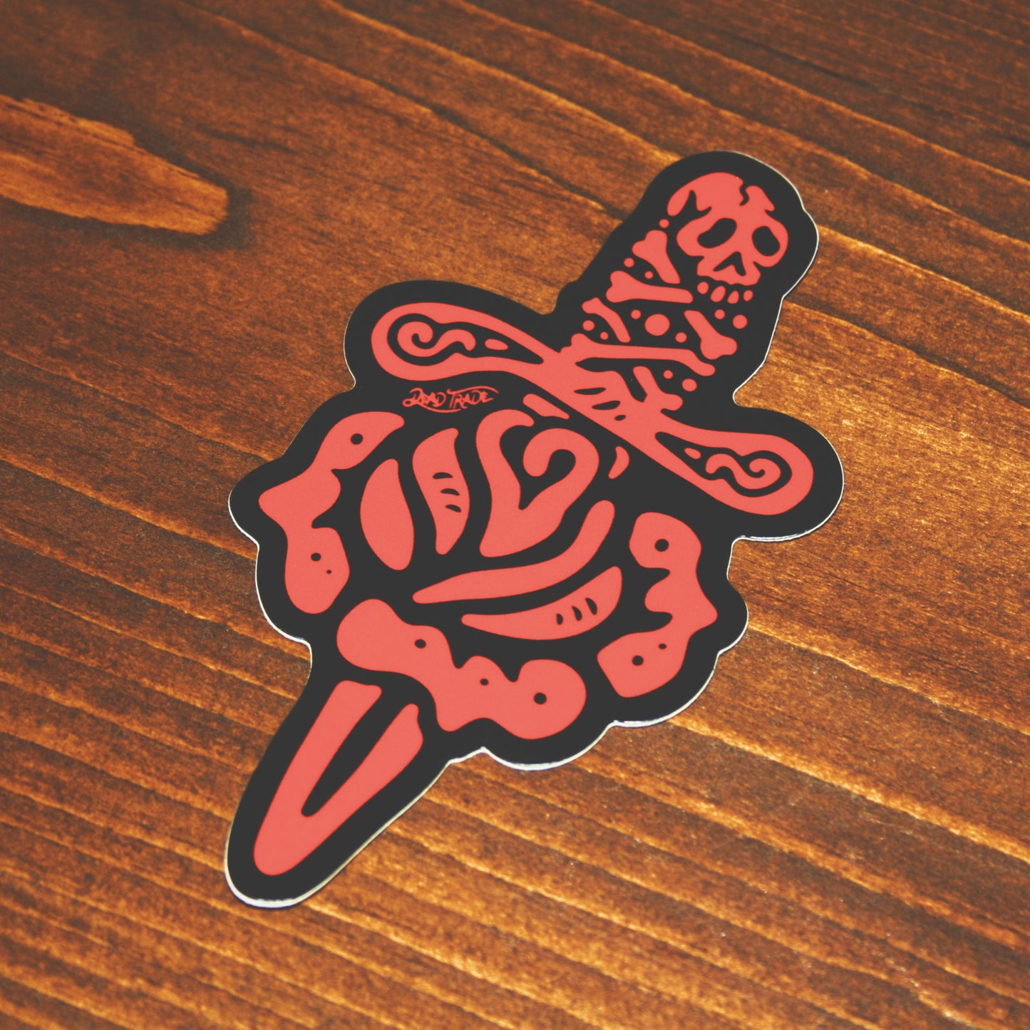 5-piece vinyl sticker pack with hand-drawn designs: rose & dagger, screw head, scatterbrain, grease monkey, and zombie in a coffin. Durable, matte finish, weather-resistant, waterproof, and dishwasher-safe. Each 4x3” sticker sticks strong to most surfaces. Made in Canada.